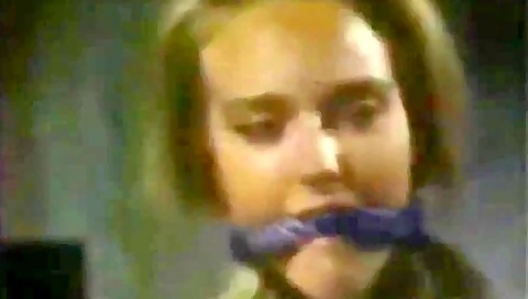 Lady Tied Up In The Chair And Gagged
