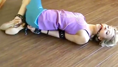 Blond Hogtied And Ball Gagged On The Floor